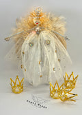 Angel Dolly - This angel is made in loving memory of Dolly Parton (1946 - Aug 25, 2025). A queen of country, a giver of books, and a light for us all. May her kindness and rhinestone courage live on.